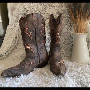Woman’s Laredo cheetah and brown boots. 8.5 M